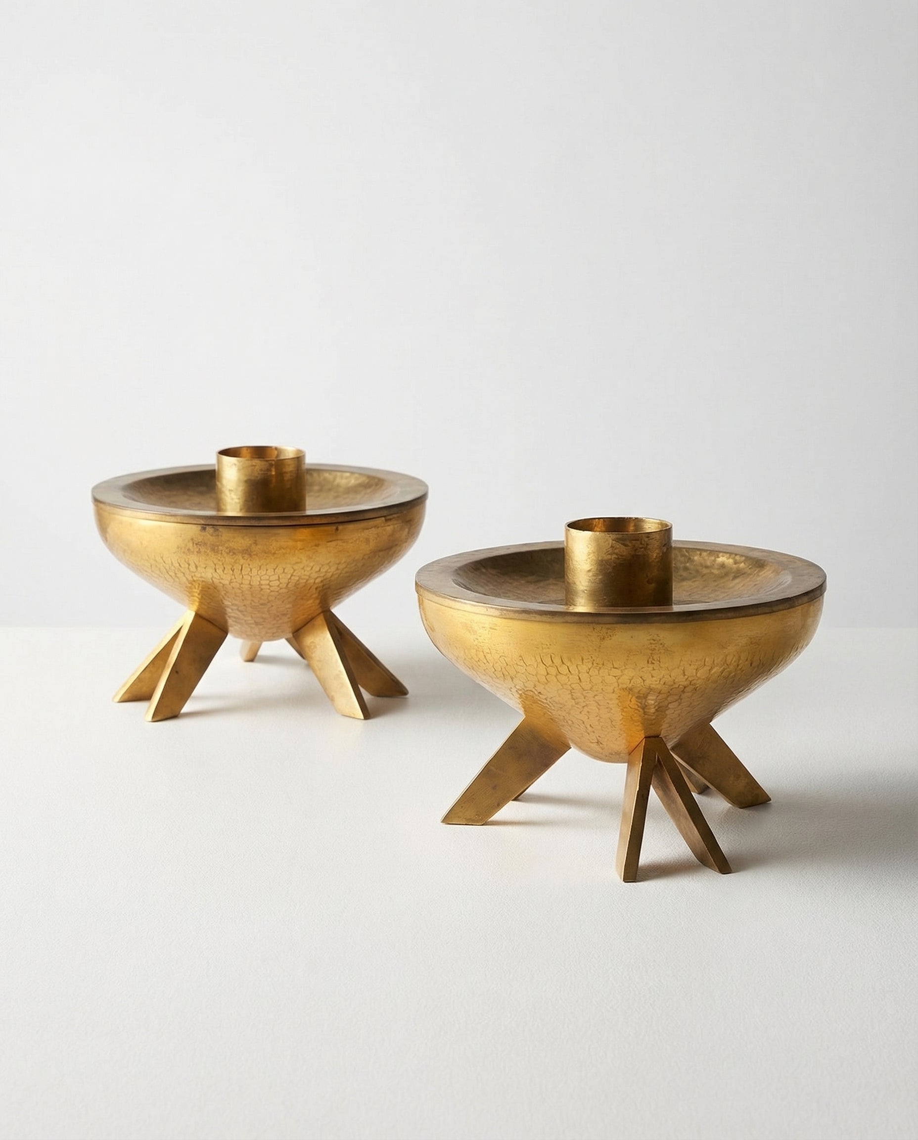 Pair of brass candelabra, Italy, 1950 circa