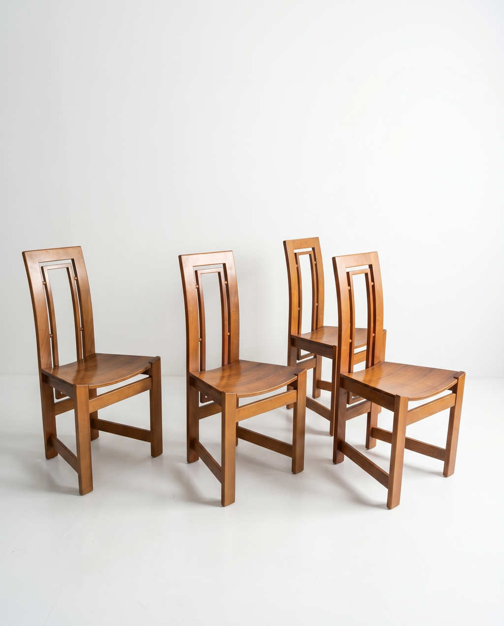 Set of four solid wood chairs, Italy, 1970.