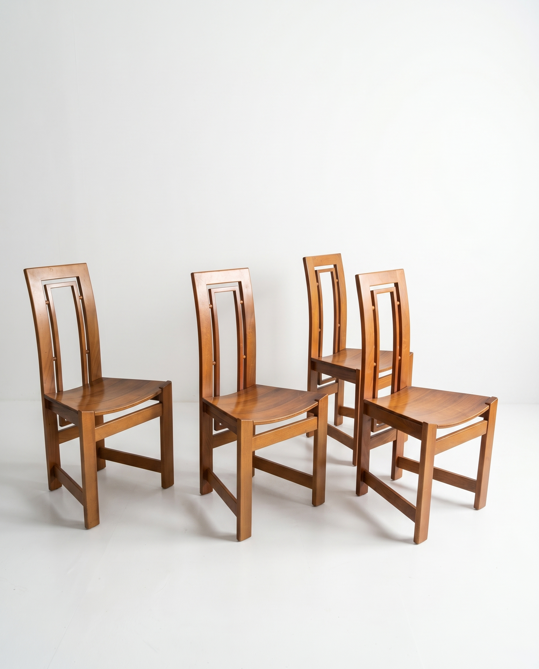 Set of four solid wood chairs, Italy, 1970.