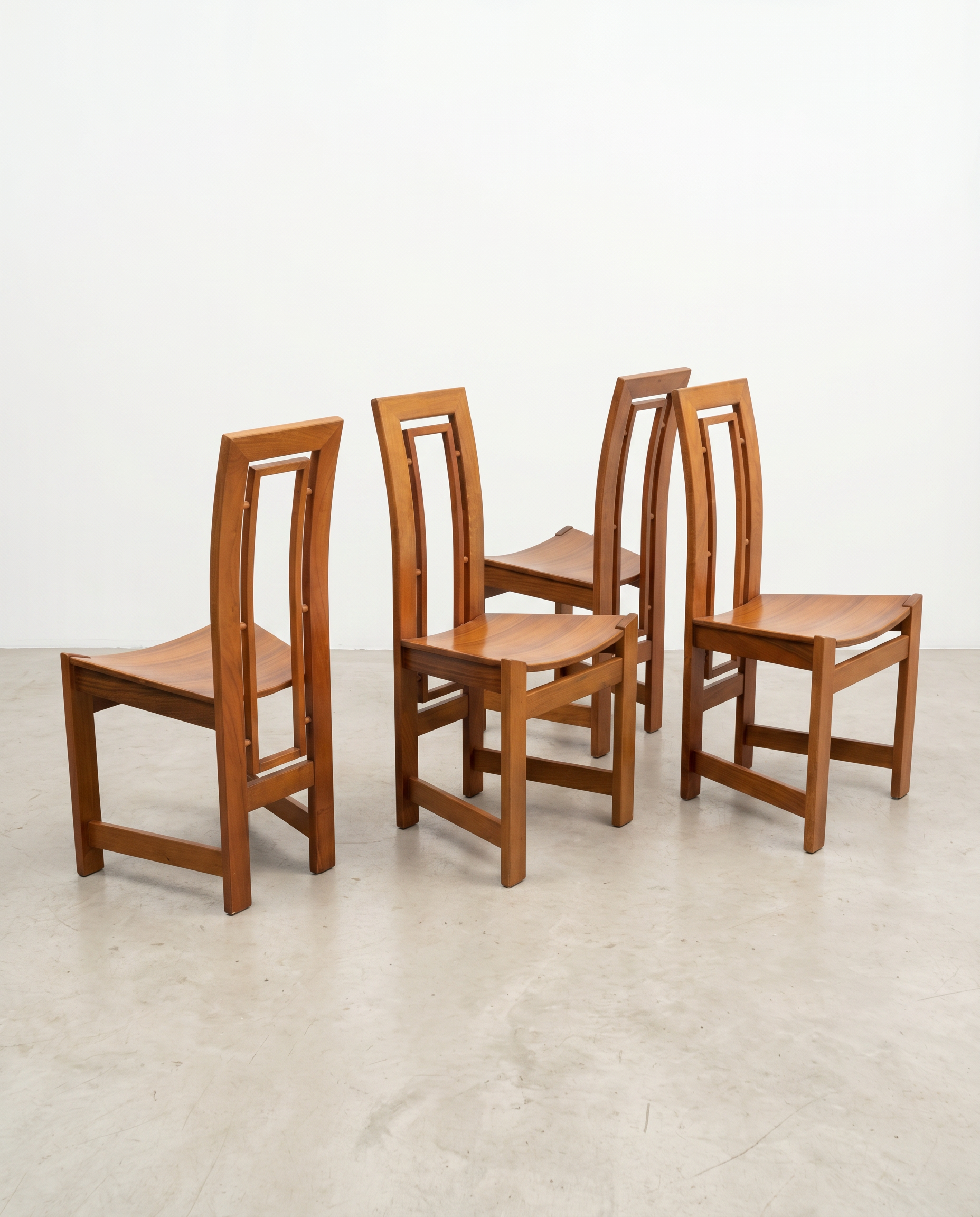 Set of four solid wood chairs, Italy, 1970.