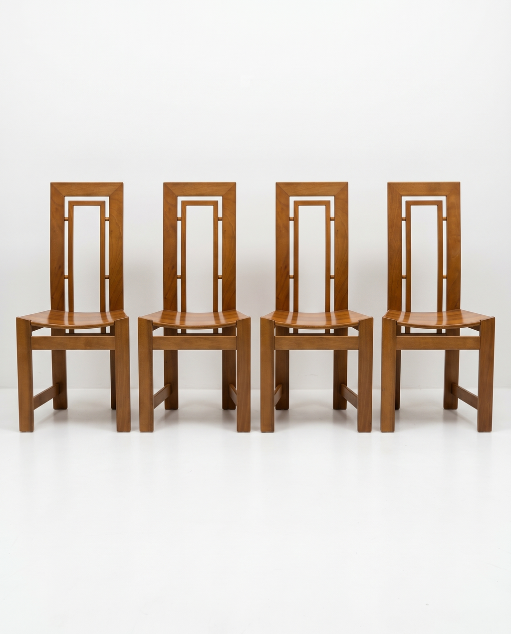 Set of four solid wood chairs, Italy, 1970.